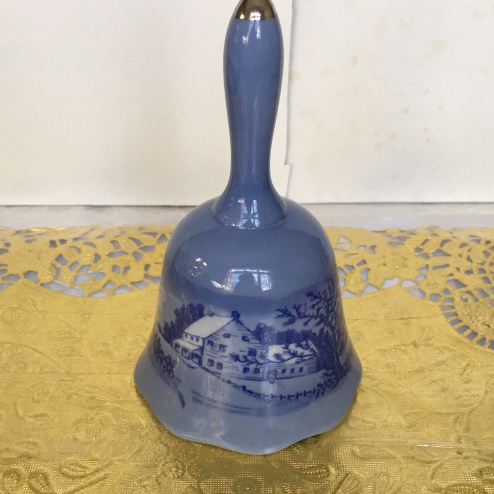 Blue and white winter scene collectible Bell